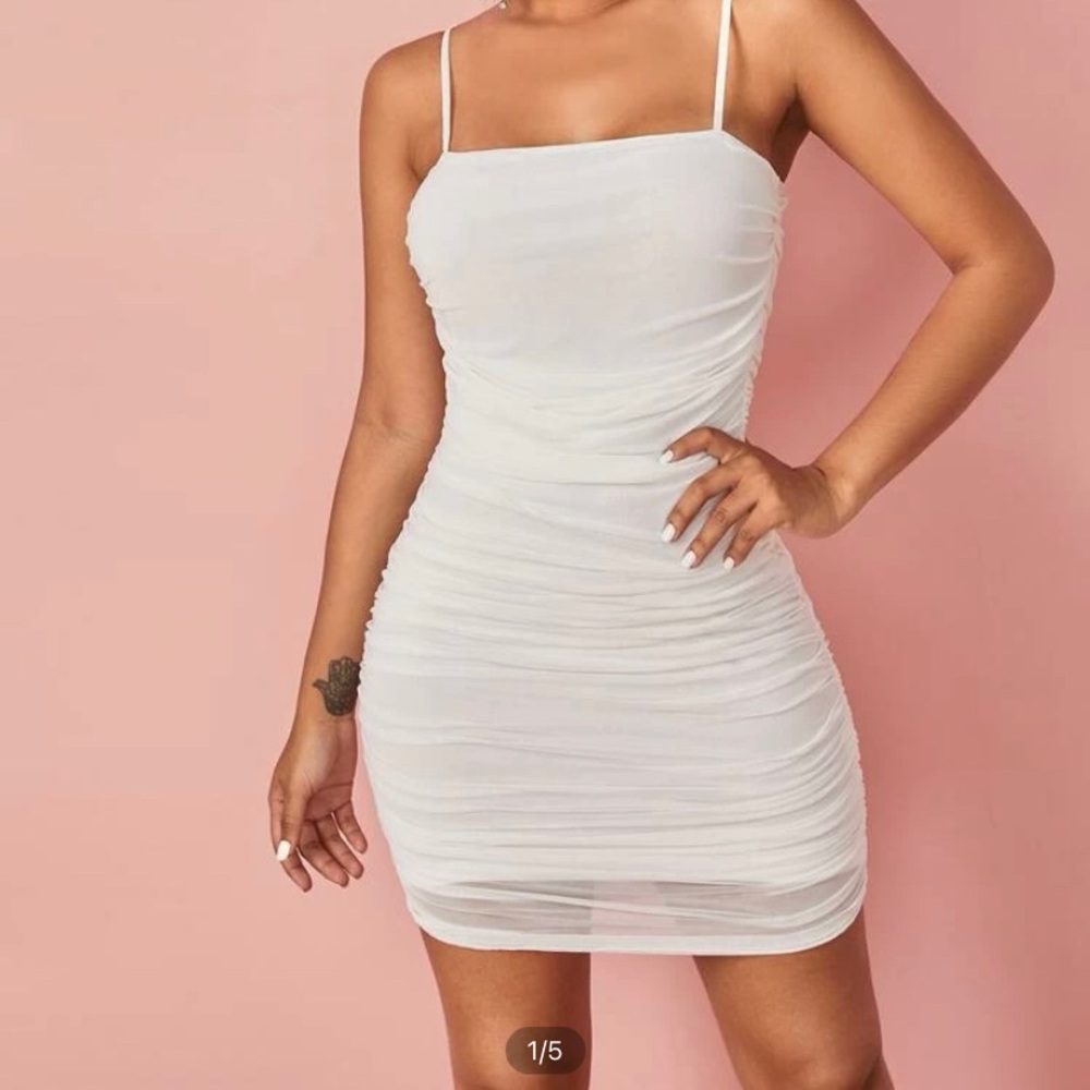 White runched dress I bought it for 20 and selling for 15. It’s never worn. - Picture 1 of 1